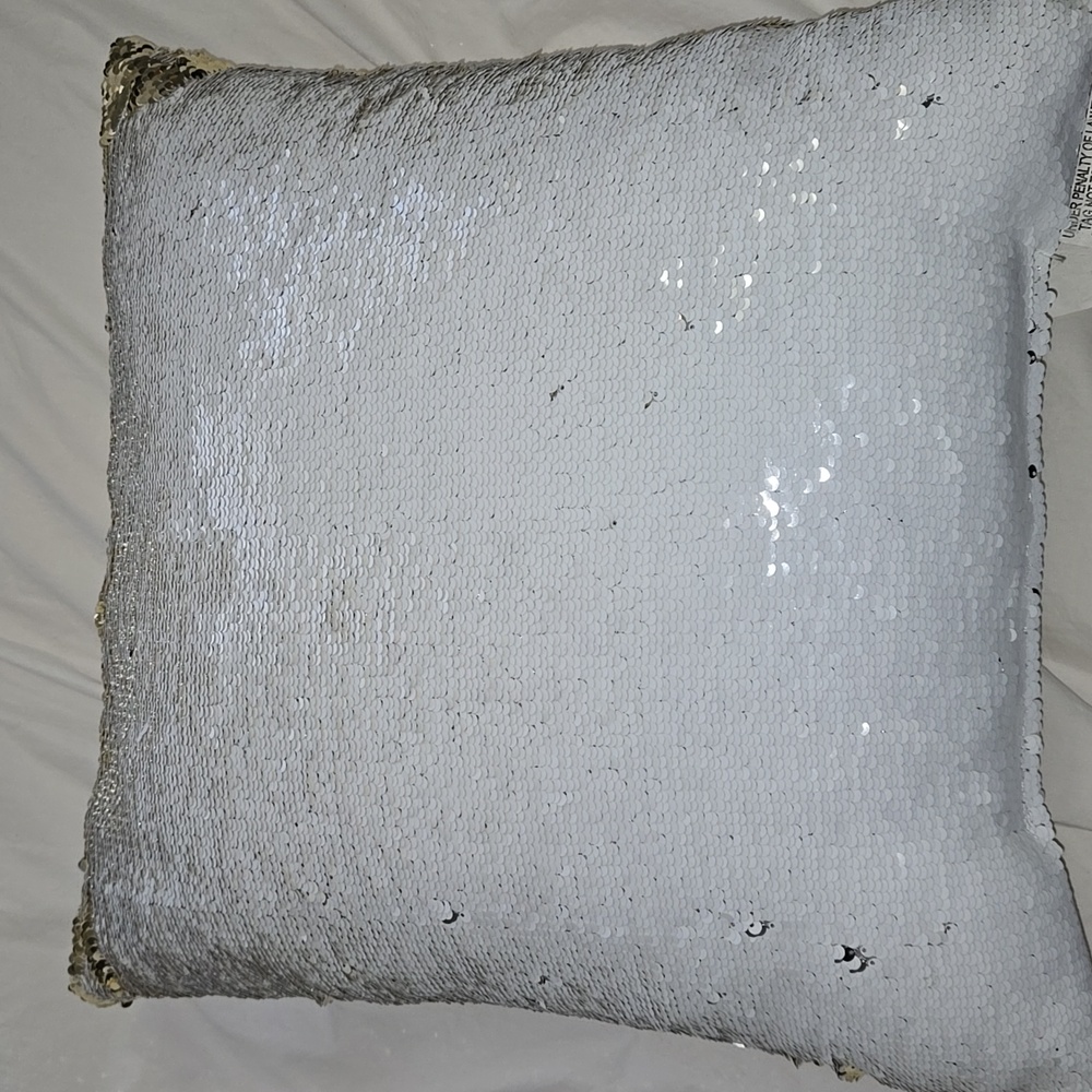 White and gold reversible sequins. White velour on other side 8" x 8" .